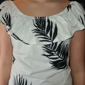 Black & white ruffled top. NWOT